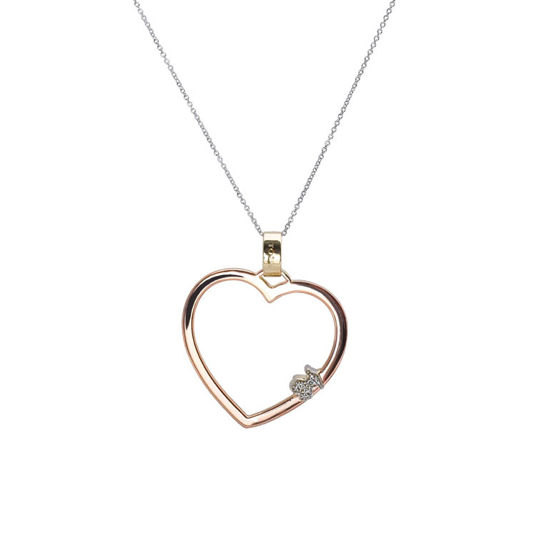 Rose gold heart shaped necklace with a diamond embellishment.