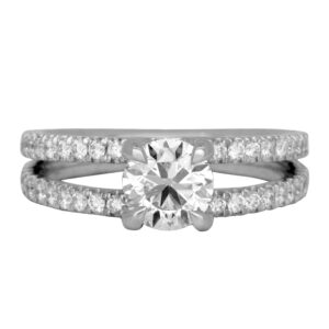 white gold split shank rings set with a round diamond and diamonds in the band