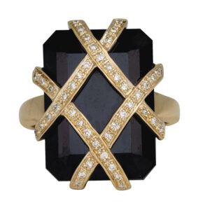 yellow gold ring set with a large emerald cut onyx with paved diamond bands overlapping the stone