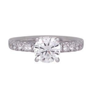 white gold ring centered with a round diamond and set with round diamonds in the band