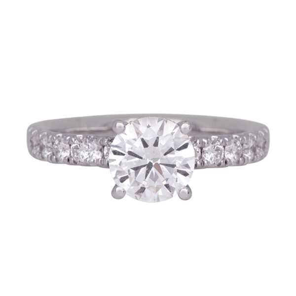 white gold ring centered with a round diamond and set with round diamonds in the band