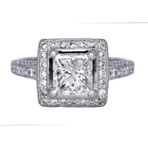 white gold engagement ring centered with a square princess diamond surrounded by a diamond halo and diamonds in the band