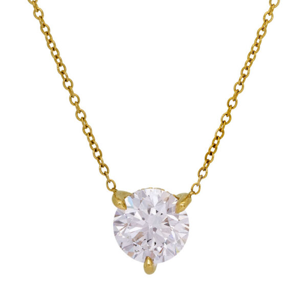 yellow gold pendant with a solitaire round brilliant diamond