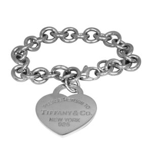 sterling silver link bracelet with a large oval heart tag