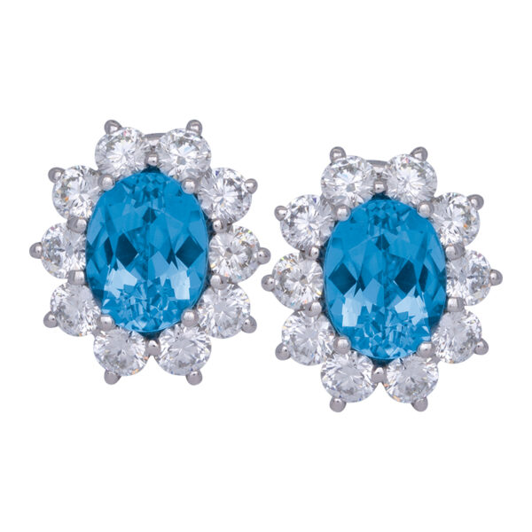 Tiffany & co. white gold halo earrings set with aquamarine centers surrounded by diamond haloes