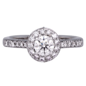 white gold halo engagement ring set with round brilliant diamonds