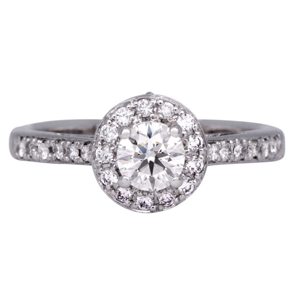 white gold halo engagement ring set with round brilliant diamonds