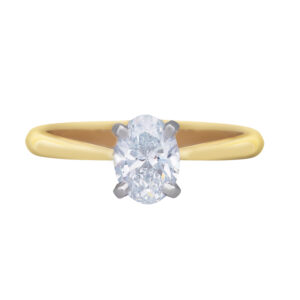 solitaire engagement ring with a yellow gold shank, white gold prongs and oval diamond