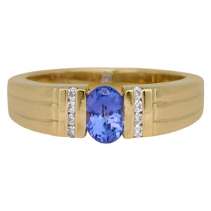 yellow gold band centered with an oval tanzanite and flanked by very small round diamonds
