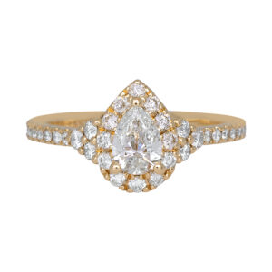 yellow gold engagement set with a pear diamond and diamond halo and diamonds in the band