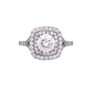 white gold engagement ring with a round brilliant triple excellent diamond surrounded by a double cushion shaped diamond halo