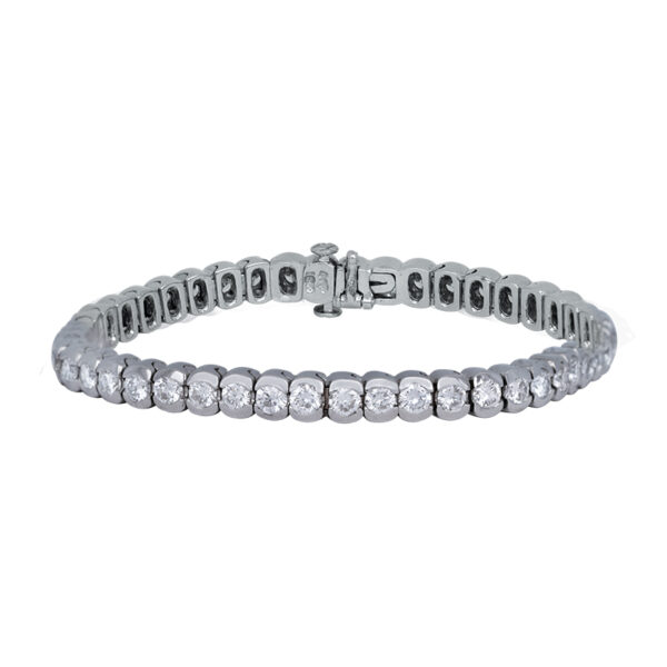 white gold tennis bracelet set with round brilliant diamonds