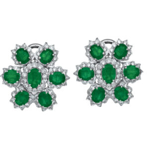 white gold cluster earrings set with 7 oval emeralds and diamond haloes