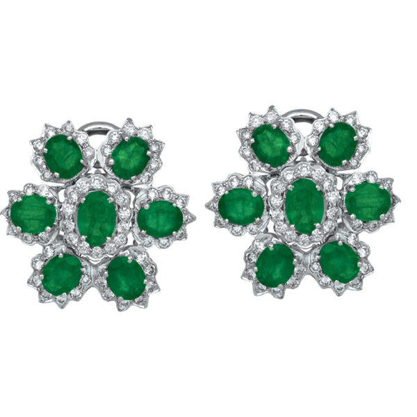 white gold cluster earrings set with 7 oval emeralds and diamond haloes