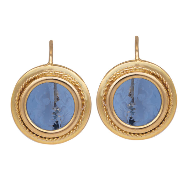 yellow gold drop earrings with round blue glass intaglio carvings featuring a scene of people