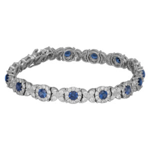 white gold vintage bracelet with blue synthetic sapphires and diamond haloes