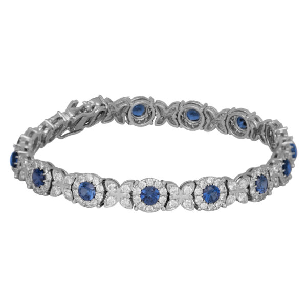 white gold vintage bracelet with blue synthetic sapphires and diamond haloes