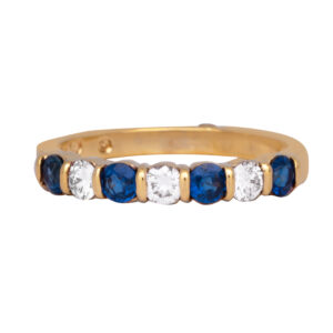 yellow gold alternating band set with round blue sapphires and diamonds