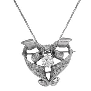vintage white gold pendant/brooch set with an old European diamond and single cut diamonds