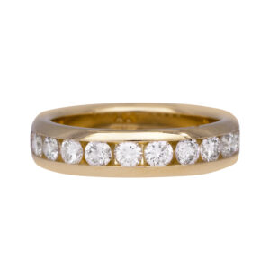 yellow gold band channel set with round diamonds