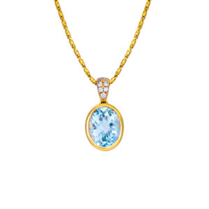yellow gold bezel set pendant with an oval aquamarine and small diamonds in the bail