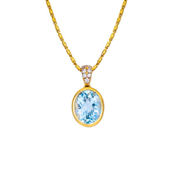yellow gold bezel set pendant with an oval aquamarine and small diamonds in the bail