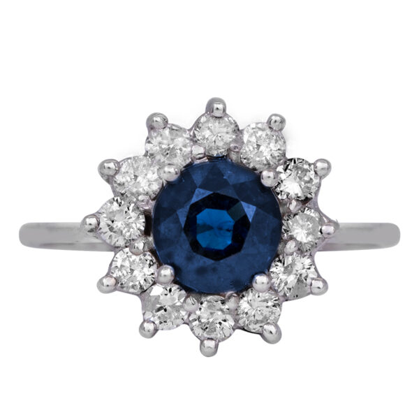 white gold flower halo ring centered with a round blue sapphire surrounded by a halo of round diamonds