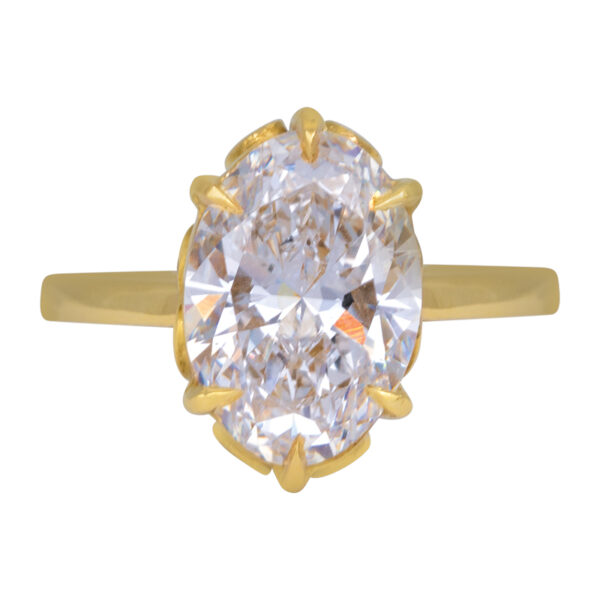 yellow gold antique style solitaire ring claw prong set with an oval diamond