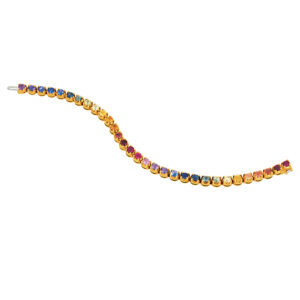 yellow gold tennis bracelet set with rainbow sapphires