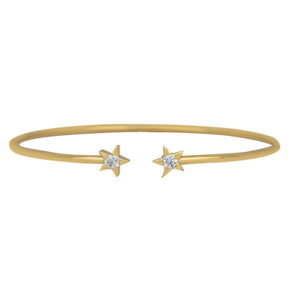 yellow gold bangle bracelet set with diamonds on the ends with star shaped settings