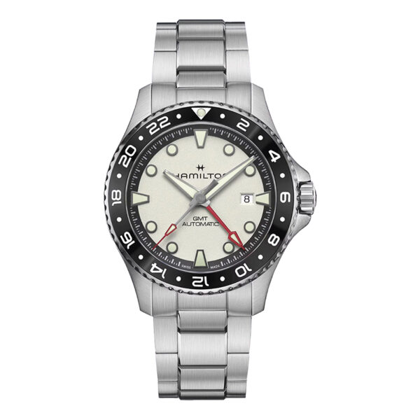 stainless steel with a silver dial, black bezel, and glow in the dark indexes
