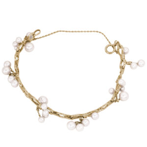 yellow gold bracelet set with bunches of Akoya pearls