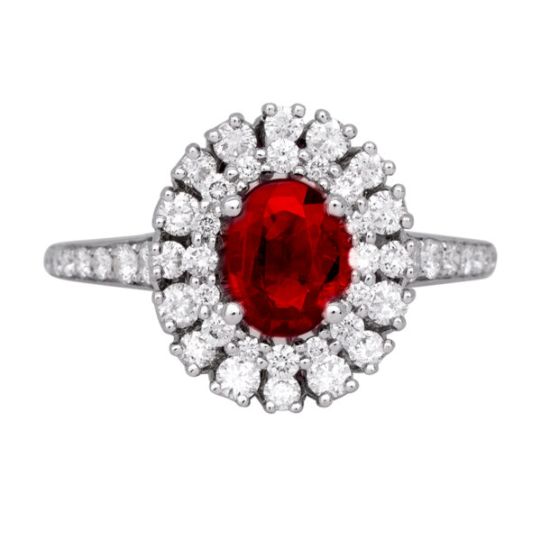 white gold double halo ring centered with an oval ruby surrounded by a double diamond halo and diamonds in the band