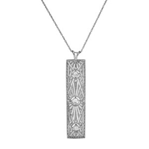 Vintage antique white gold rectangular pendant set with old mine, old European, and rose cut diamonds.