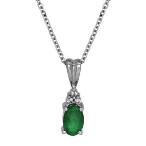 white gold pendant with an oval emerald and small round diamonds