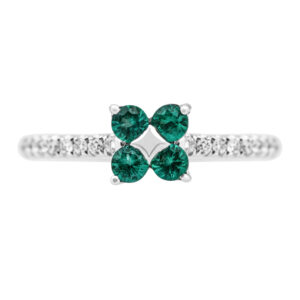 white gold ring, four round emeralds centered and round brilliant diamonds in the band