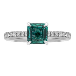 white gold ring, princess cut emerald and round brilliant diamonds in the band