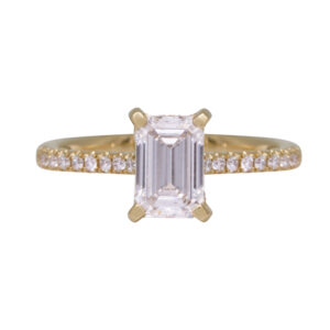 yellow gold engagement ring centered with an emerald cut diamond and set with round brilliant diamonds in the band