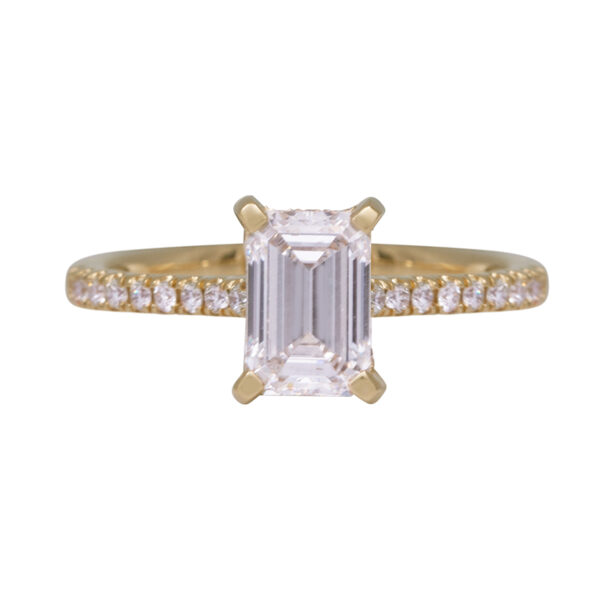 yellow gold engagement ring centered with an emerald cut diamond and set with round brilliant diamonds in the band