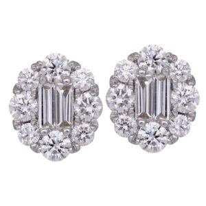 white gold diamond halo earrings centered with baguettes and surrounded by relatively large round diamonds