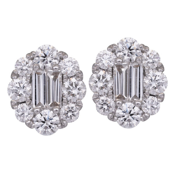 white gold diamond halo earrings centered with baguettes and surrounded by relatively large round diamonds
