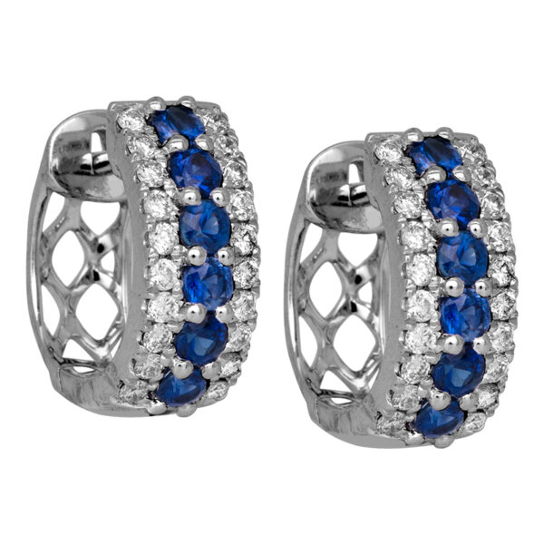 white gold hoop earrings set with round blue sapphires bordered by smaller round diamonds