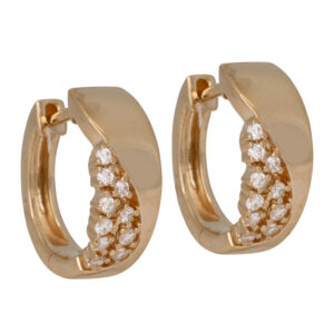yellow gold hoop earrings set asymmetrically with small round diamonds