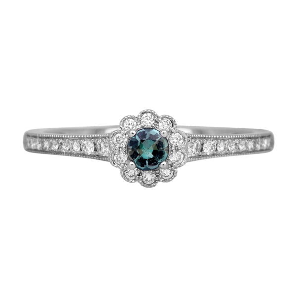white gold ring centered with a small round alexandrite surrounded by a round diamond halo and diamonds in the band