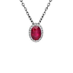 white gold halo pendant set with an oval ruby and a round brilliant diamond halo