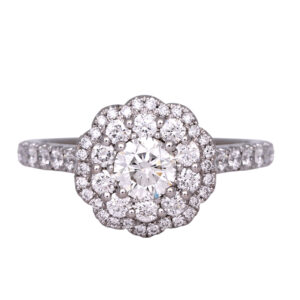 white gold engagement ring centered with a round diamond and surrounded by a double diamond halo with diamonds in the band
