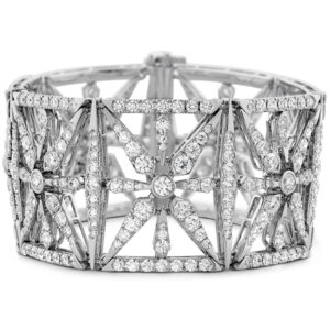 white gold wide cuff bracelet with star motif set with 22 carats of round brilliant diamonds