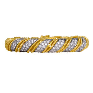 retro white and yellow gold woven bracelet set with round diamonds
