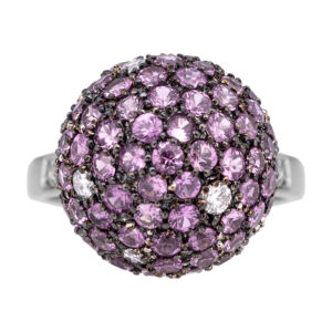 white gold globe ring set with mostly pink sapphires and a few white diamonds