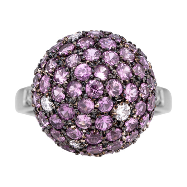 white gold globe ring set with mostly pink sapphires and a few white diamonds
